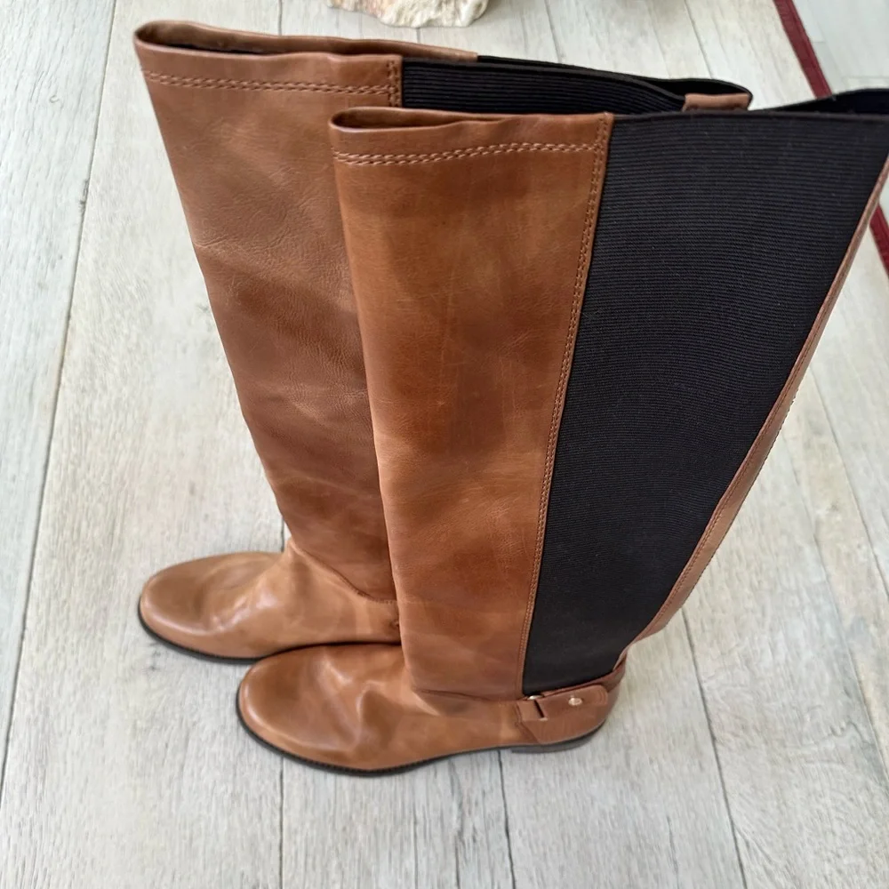 Stuart Weitzman Black and Brown Boots for Versatile Style